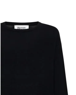 Black sweater with dropped hem