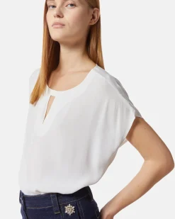 Blouse with teardrop opening