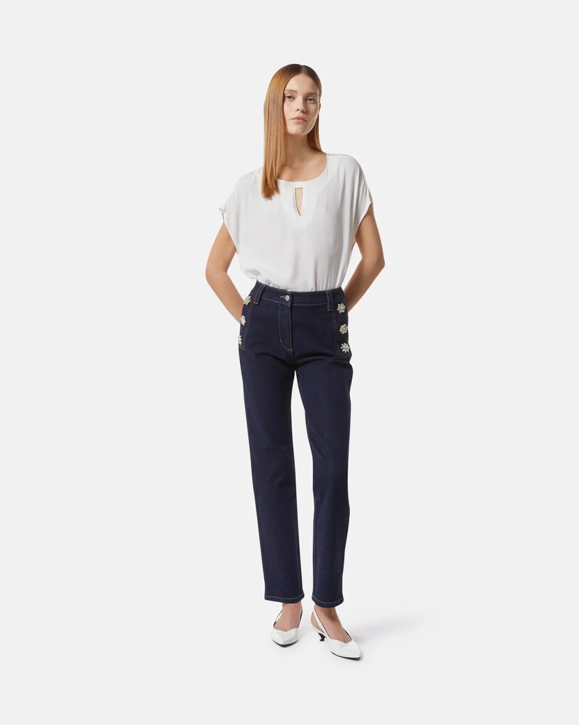 Dark denim jeans with jewel buttons