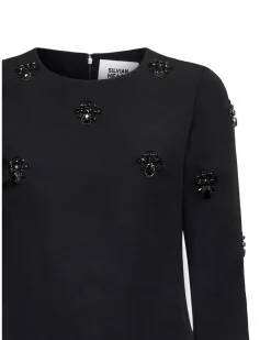 Dress with jewel details and lace