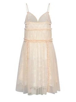Dress with thin straps and decorative details
