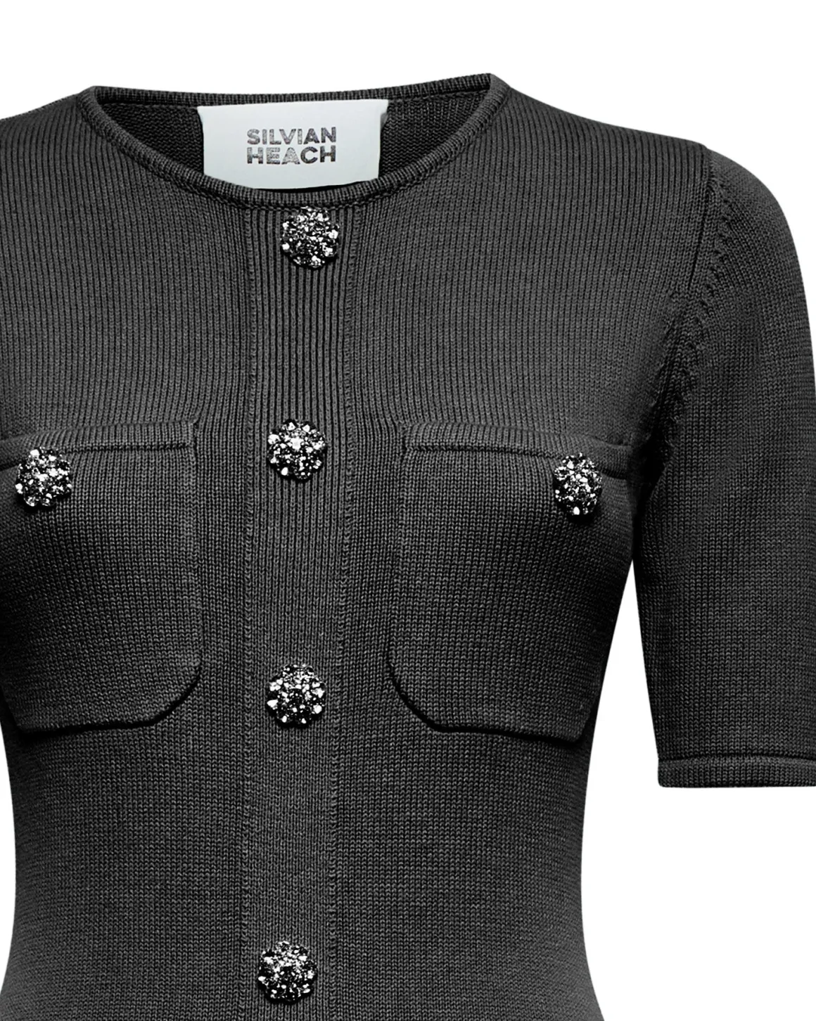Fitted dress with decorative buttons