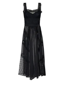 Long dress with plays of transparencies and refined design