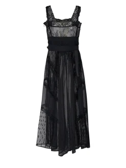 Long dress with plays of transparencies and refined design