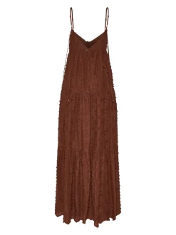 Long dress with thin straps and decorated surface