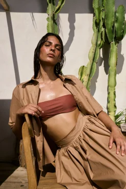 Long skirt with curled details