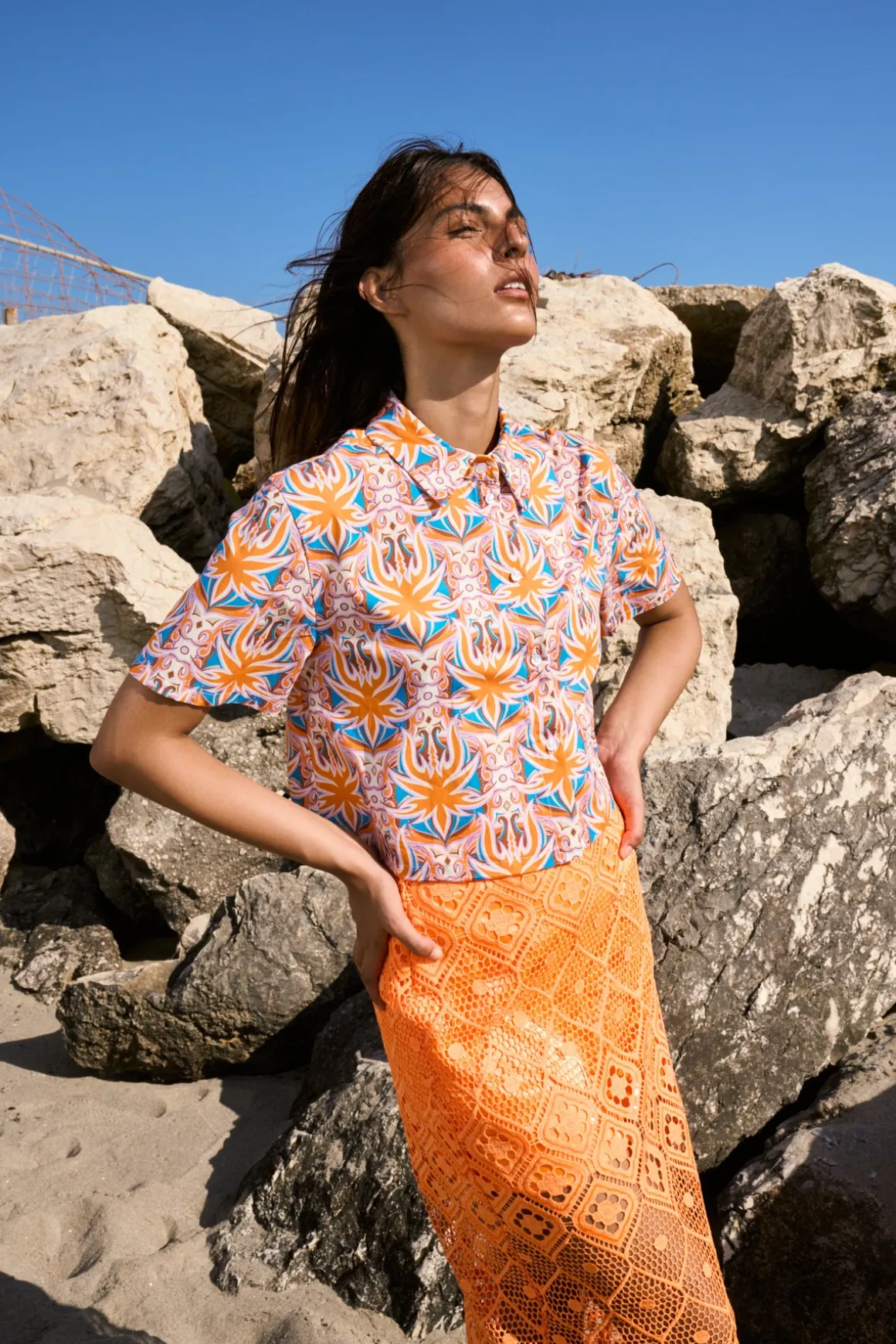 Longuette skirt in pierced fabric