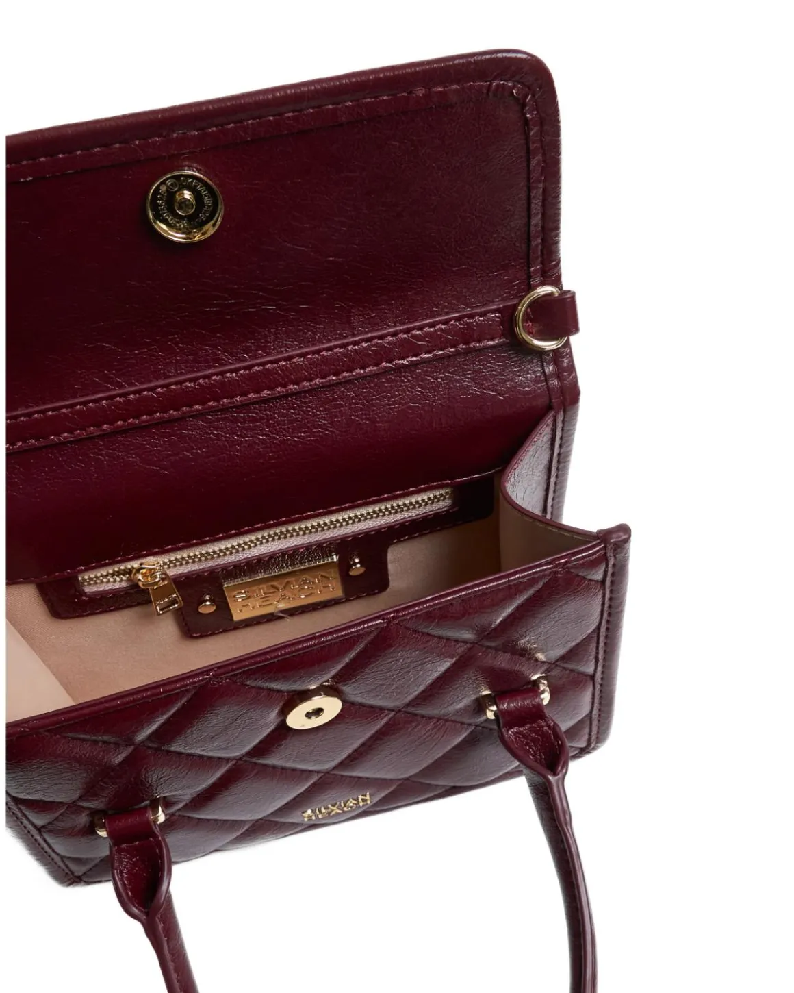Quilted bag with handle and chain