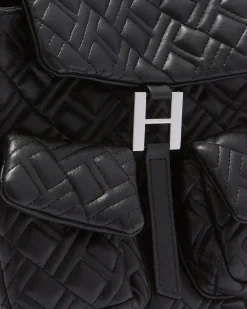 Quilted eco -leather backpack with flap closure