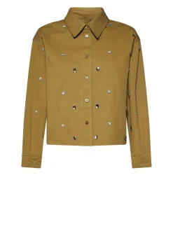 Shirt decorated with precious applications