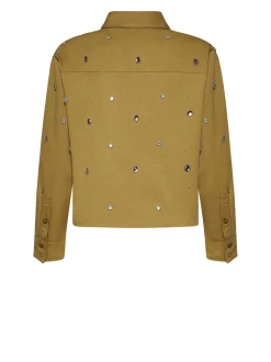 Shirt decorated with precious applications