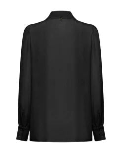 Shirt with bow at the neck