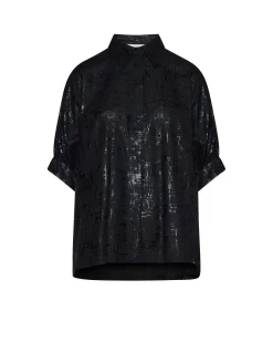 Shirt with luminous effect surface