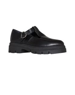 Shoe with strap and structured sole