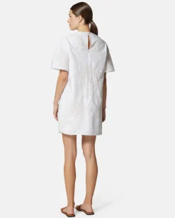 Short dress with contrasting decorative embroidery