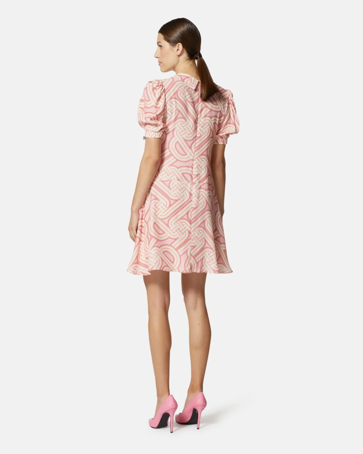 Short dress with geometric print and central bow