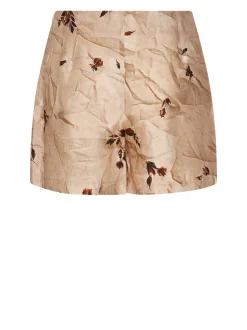 Short skirt with floral pattern and decorative buttons