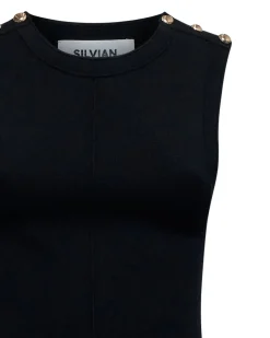Sleeveless dress with contrasting ruffles