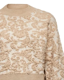 Sweater with embossed floral motif