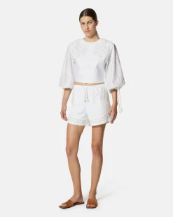 Top crop with sliced 窶銀菊mbroidery and sleeves