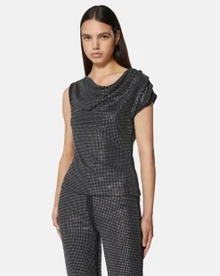 Top with drapes and light applications