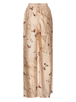 Trousers with botanical print and fluid line