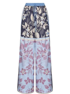Trousers with decorative pattern and fluid design