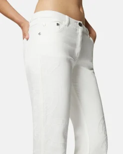 White embroidered jeans with straight leg